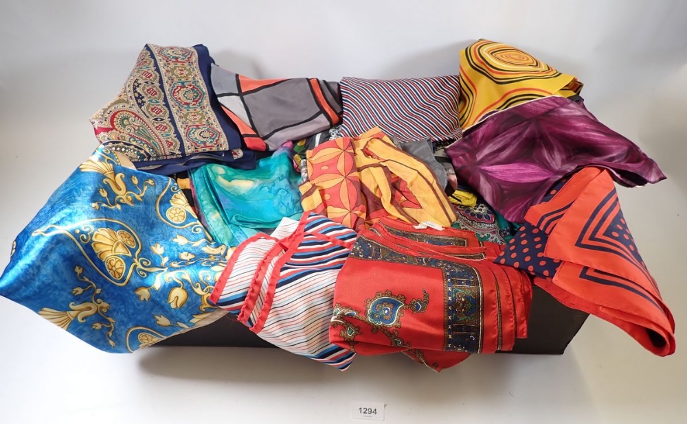 A large quantity of scarves including many silk and designer ones