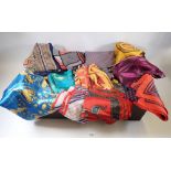 A large quantity of scarves including many silk and designer ones