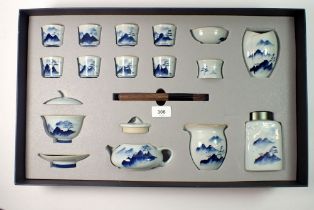 A ceremonial eight person Chinese tea service complete, cased