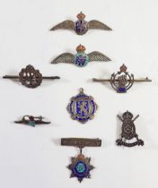 Seven various silver military sweetheart brooches for RAF etc and a silver football medal