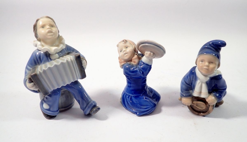 A set of three Copenhagen child band figures, tallest 11cm