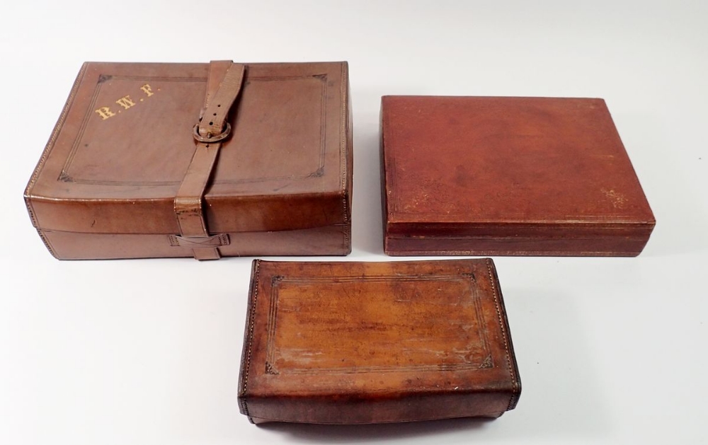 Three Edwardian leather stationary/correspondence boxes