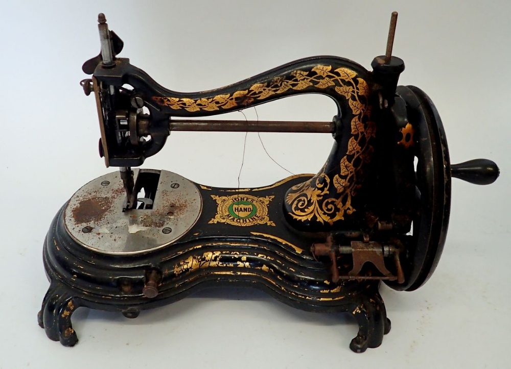 A Victorian Jones sewing machine in fitted box