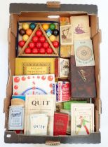 A box of vintage games including a set of children's snooker balls, bridge, Bezique, Solitaire etc.