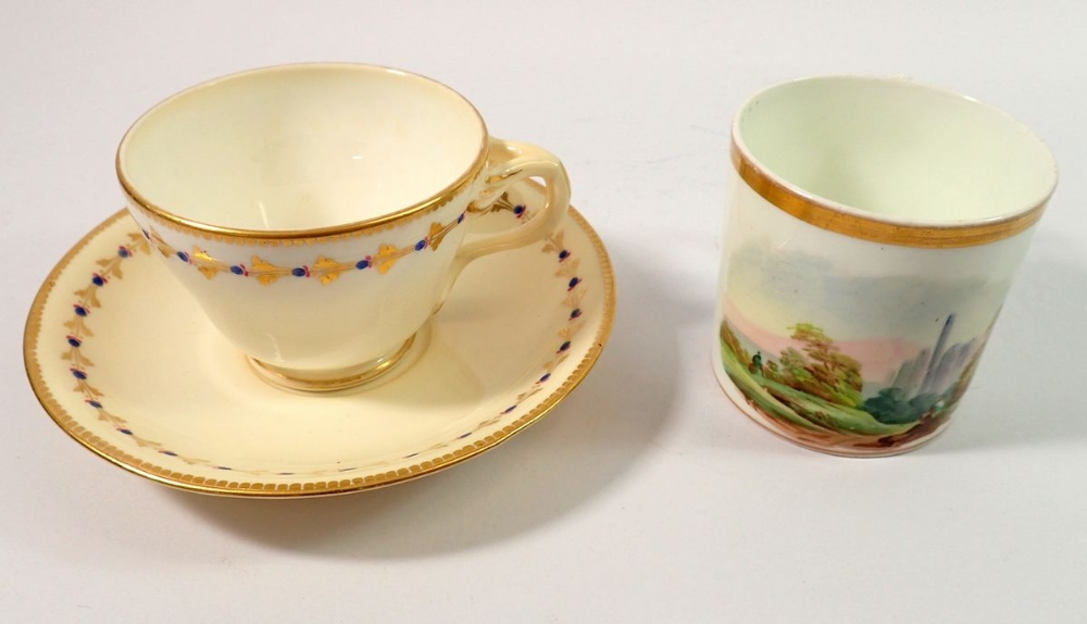 A Worcester Kerr Binns teacup and saucer with blue and gilt border and a 19th century coffee can