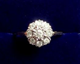 An 18 carat white gold diamond cluster ring, size P to Q, 2.9g