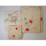 A vintage floral embroidered table cloth and matching napkins and other table linen