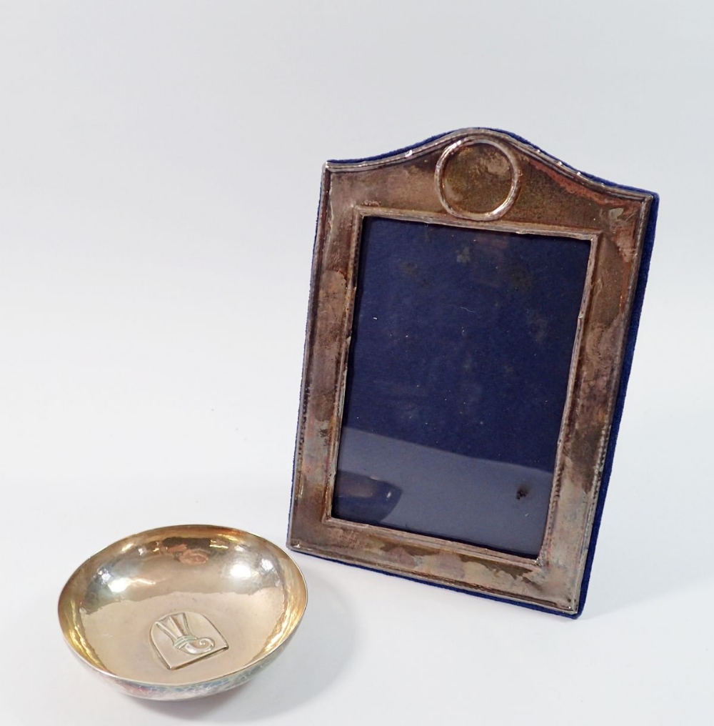 A silver rectangular photo frame, 20.5 x 14cm and a white metal pin dish marked U Sauter, 10cm