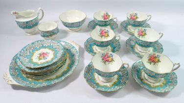 A Royal Albert 'Enchantment' tea service comprising six cups and seven saucers, six side plates, two