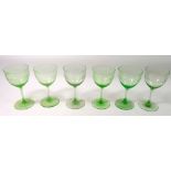 A set of six Edwardian green cocktail glasses