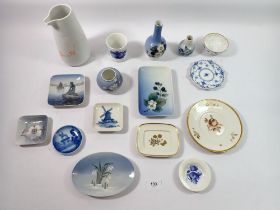 A group of Copenhagen porcelain including vase, jugs, pin dishes etc