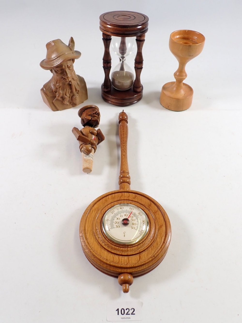 A wooden egg timer and various treen