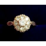 A 9 carat gold antique style cluster ring set white stones, size O to P, 2.5g