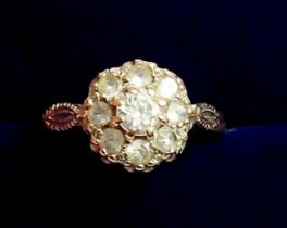 A 9 carat gold antique style cluster ring set white stones, size O to P, 2.5g