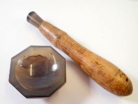 A 19th century small apothecary carved stone pestle and mortar, 4.5cm wide