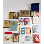 A box of packs of playing cards including De La Rue, Congress, Waddingtons, Wills's etc