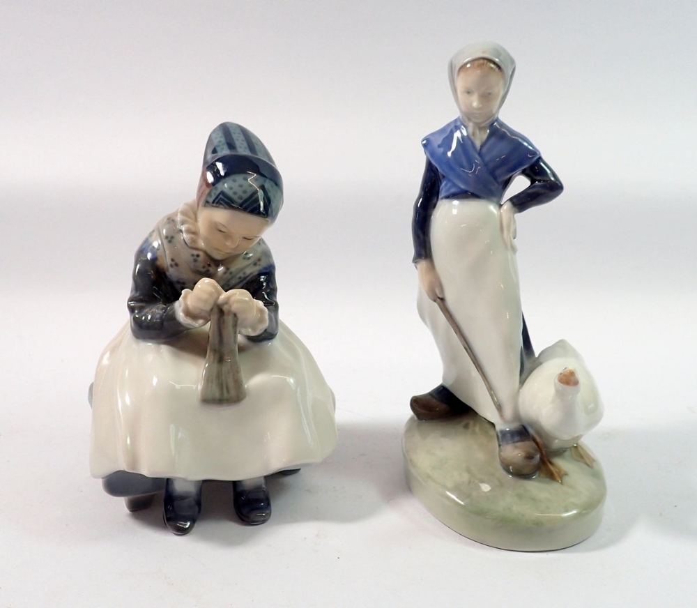 Two Copenhagen figures of goose girl and girl knitting, 18cm and 16cm tall