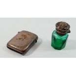 A silver topped green cut glass smelling salts bottle plus a silver vesta case engraved 'Charlie