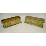 A pair of reconstituted stone garden troughs decorated classical motifs 63x23cm
