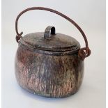 A Victorian large oval cooking pot with lid and hinged iron handle, 47cm wide