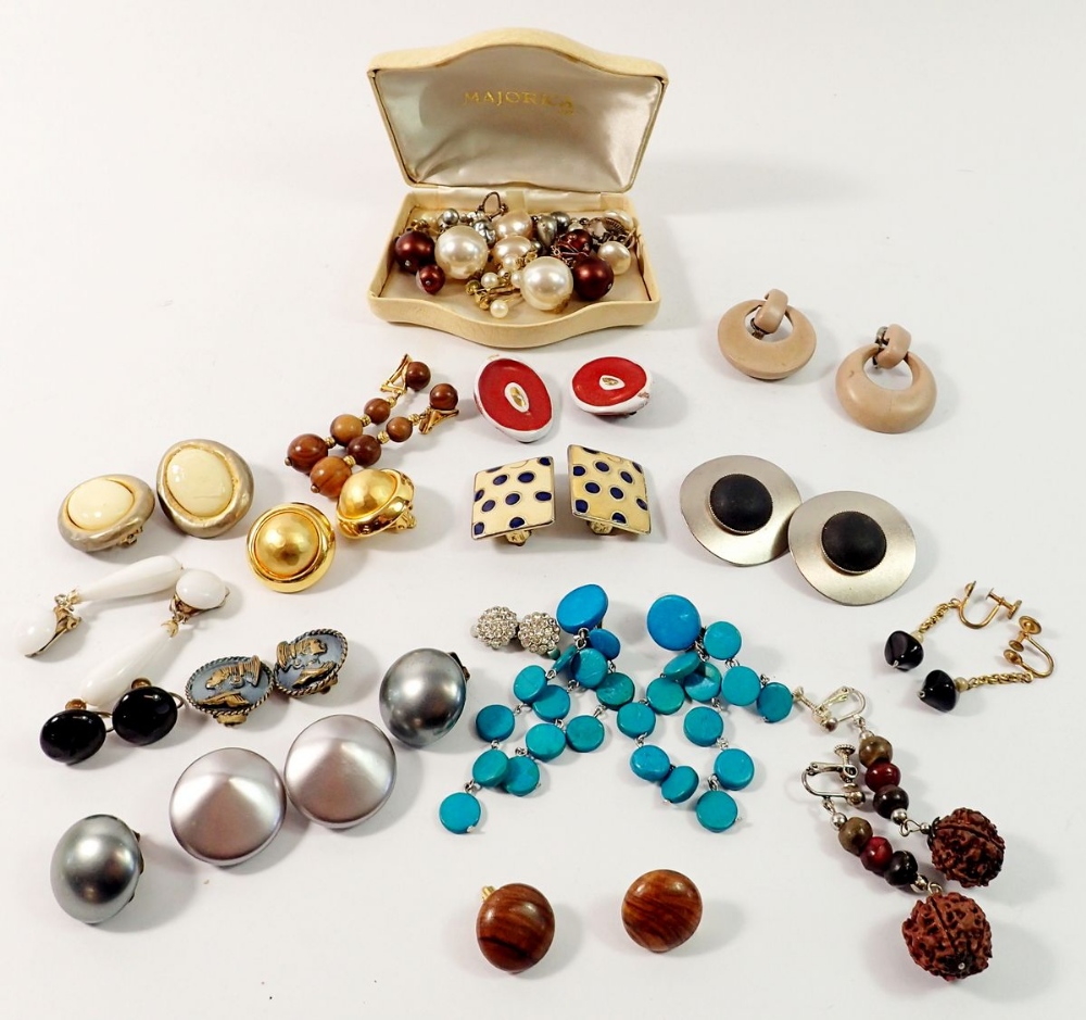 Twenty one pairs of vintage clip earrings