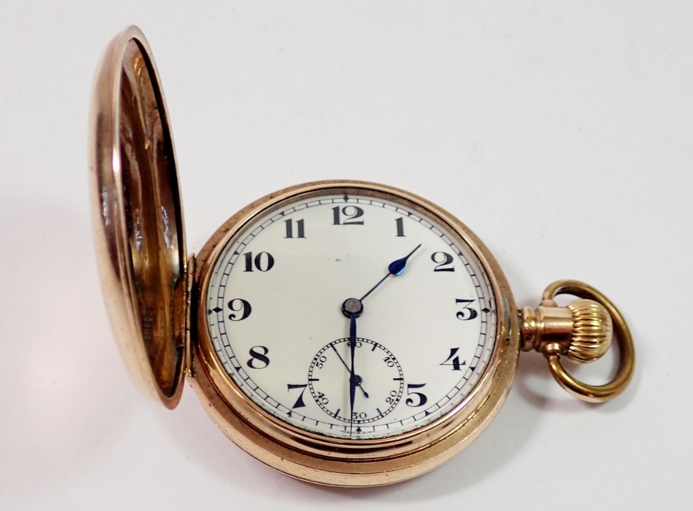 A Swiss jewelled rolled gold full hunter pocket watch in a Dennison case with Arabic dial