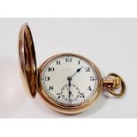 A Swiss jewelled rolled gold full hunter pocket watch in a Dennison case with Arabic dial