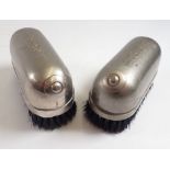 A pair of Mutax hot water hat brushes