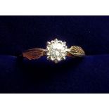 An 18 carat gold illusion set diamond ring, size M, 2.7g