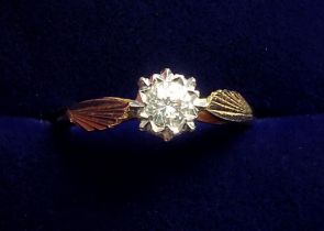 An 18 carat gold illusion set diamond ring, size M, 2.7g