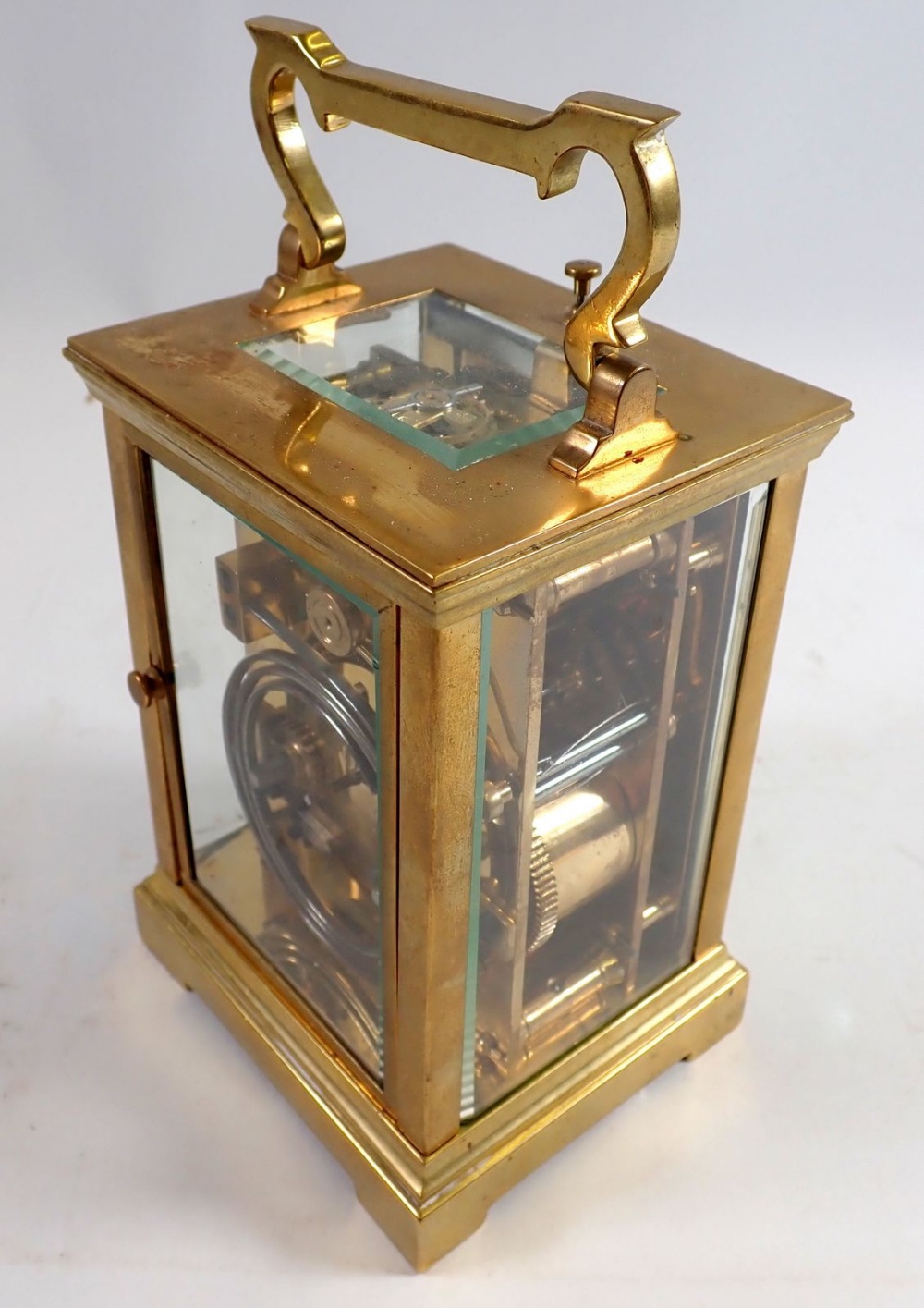 A brass carriage clock retailed by Marcks & Co Ltd, Bombay, presented to Mr Chatterton in Nagpur - Image 4 of 6