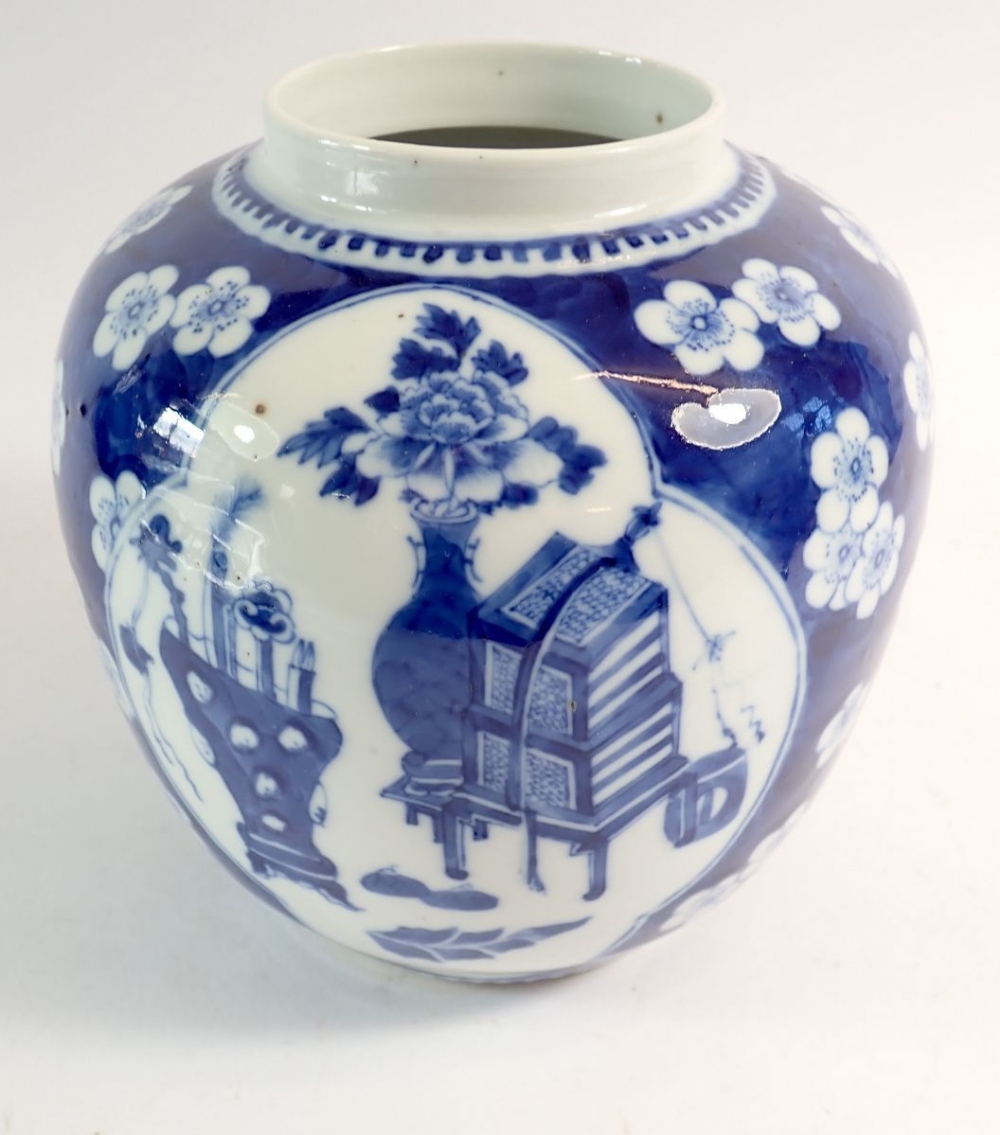 A late Qing Dynasty Chinese blue and white ginger jar with prusnus blossom and panelled - Image 2 of 5