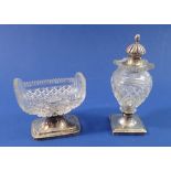 A cut glass silver salt and pepper with Dutch silver mounts, pepper 12cm tall