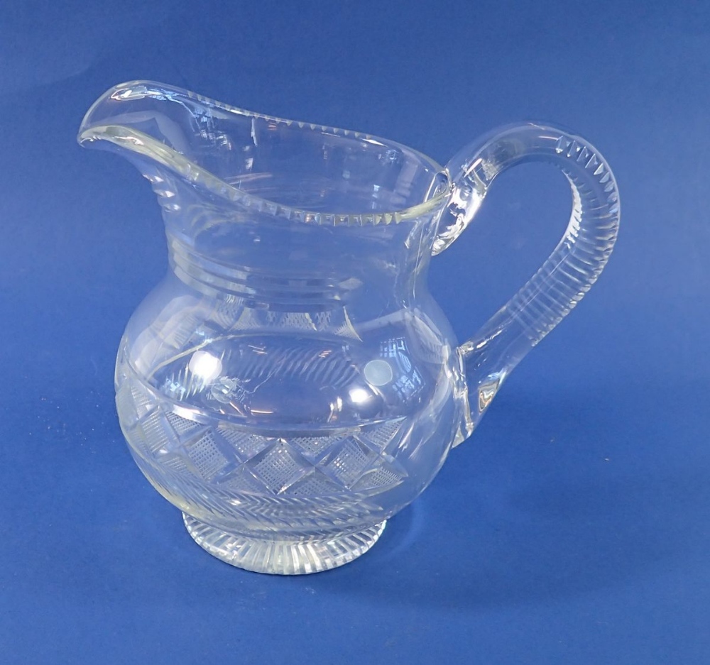 A Georgian Irish Cut glass jug, 17cm tall