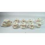 A Royal Albert tea service Lavender Rose including six cups and saucers, six tea plates, cake plate,