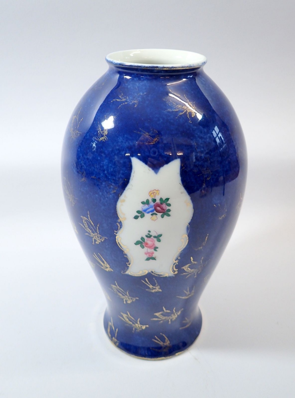 A blue and gold Worcester style vase with floral relief panels, base marked 877/4527, 27cm tall - Image 2 of 2