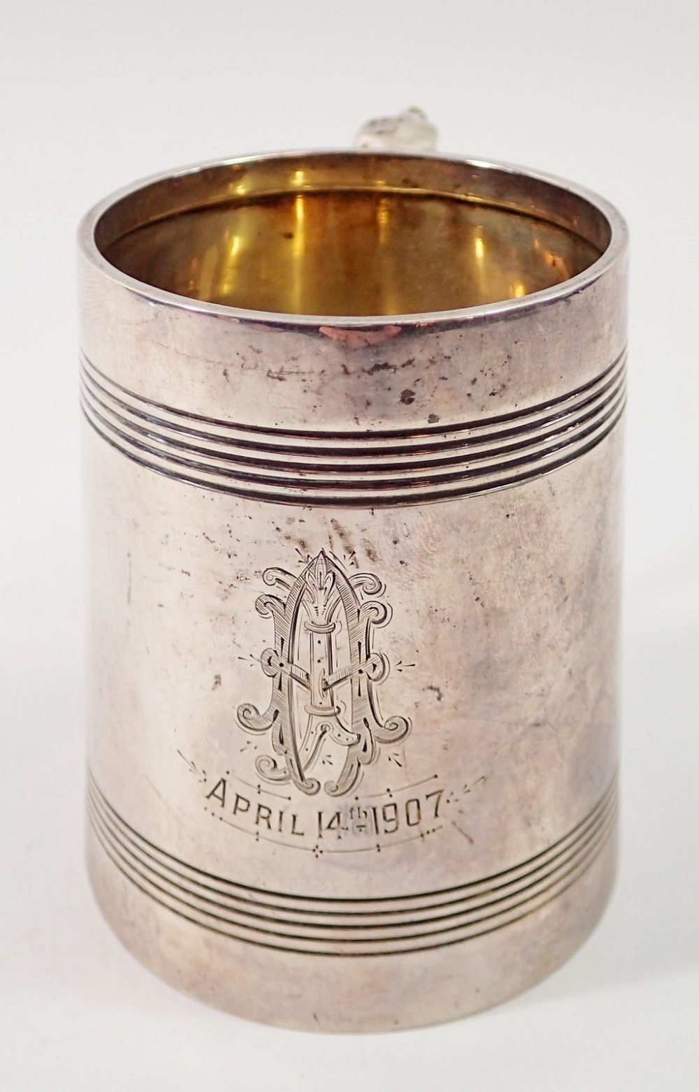 An Edwardian silver reeded small tankard with scroll handled, engraved monogram and dated 1907, - Image 2 of 3