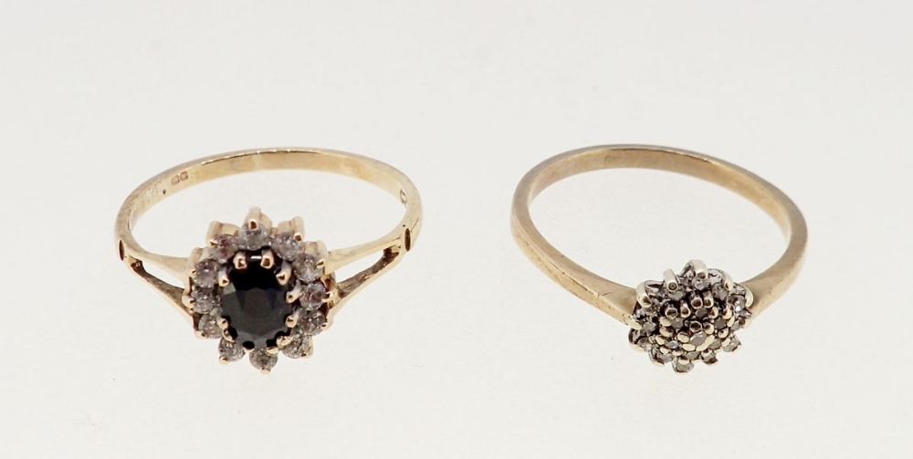 A 9 carat gold diamond cluster ring, size N, 1.6g and a 9 carat gold sapphire and white stone
