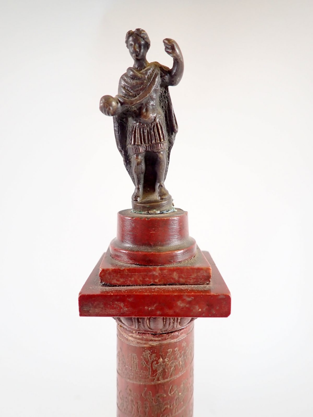 An Italian red marble and gilt metal mounted replica of a Roman column etched battle scene and later - Image 2 of 4