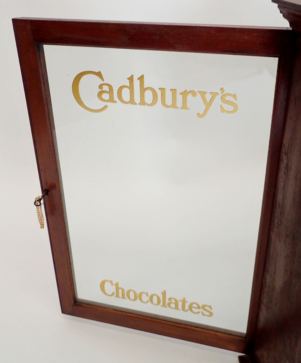 An Edwardian mahogany two door glazed Cadbury's Chocolate shop display cabinet with glass doors - Image 9 of 9