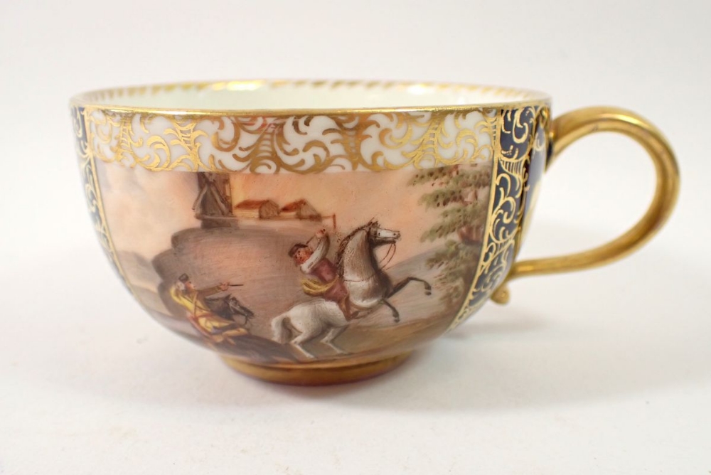 A Meissen cabinet cup painted scenes of men fighting on horseback alternating with blue and gilt - Image 4 of 7