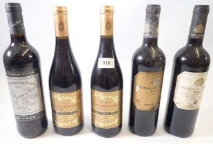 Five various bottles of Rioja wine including Baron de Barbon, Martinez Bujanda and Los Hermanos