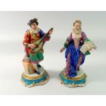 A mid 19th century pair of French porcelain figures of mandolin player and singer in the style of