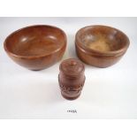 Two wooden fruit bowls and a wooden pot