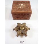 An Indian brass Kumkum Hindu spice box and a carved wooden box