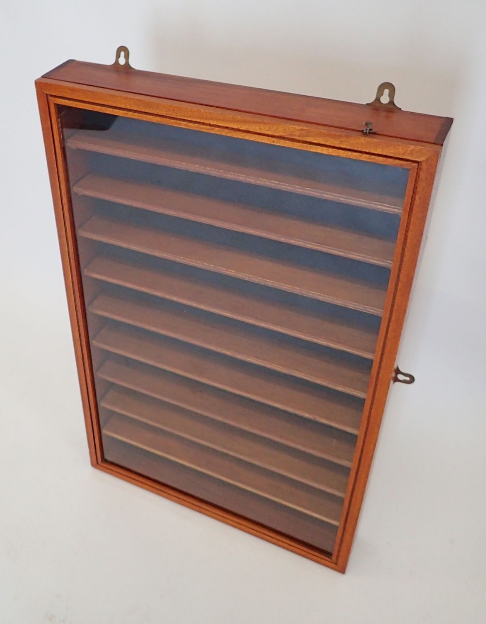 A glass fronted wall collectors or display cabinet, 74cm wide