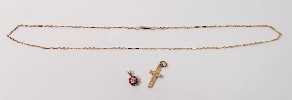 A 9 carat gold fancy link necklace, 3g, a 9 carat ruby and diamond pendant and a 9 carat gold