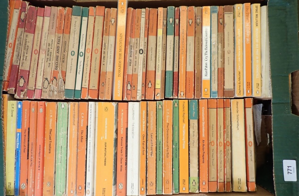 A box of vintage Penguin paperback books