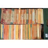 A box of vintage Penguin paperback books