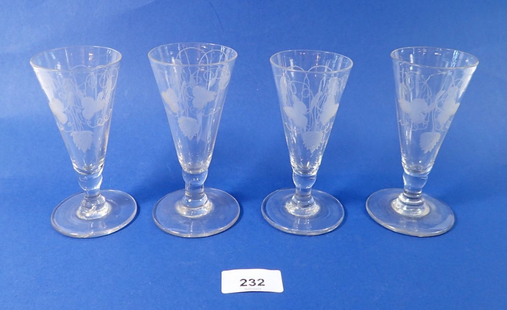 A set of four Georgian glass ale flutes engraved hops, 12cm